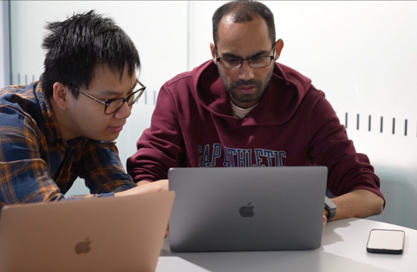 Photo of Jonathan Zhengn with a trainee